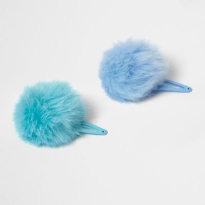 Girls blue pom pom hair clips
